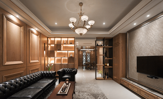 客厅 The living room 

客厅作为家的核心，亦是聚会的处所，
于机能美感间的拿捏便至关重要，
即便是素简的柜体收纳，也得以各样形式呈现，
或镶嵌灯源、或相间茶玻，层次恰到好处，
灵动的光影流露一抹清幽澹雅，
为场域蒙上一层柔和光晕。
电视主牆採用丝线光泽壁布，
以质为雅，以简为美，
柔化区域中的深色韵致，
为家居挹注一股柔和张力。

过道处一侧，以形为体，
将亚洲的「亚」字，转化至牆面形体，
对映餐区的雕花门片，展现东、西方元素，
交相融汇的和谐视觉。

The living room plays a role as the heart of home and also the area for family gathering, therefore it is very important to balance the function and aesthetics. 
Even the simple storage cabinets might present in various forms, for instance the inlaid illumination or coupled with amber-yellow glass. The perfect layers of the excellent lightings manifest the space with soft glow; furthermore bring about a serene and elegant ambience.

The main TV wall is decorated with the glossy silk wall cloth, which is stylish and glorious in simplicity; in the meantime with the function to moderate the profound theme and pose the gentle element of furnishing.

On one sidewall of the foyer, modeled a Chinese character of "Asia" on the wall surface, which coordinate with the carved door pieces of the dining area, so as to show up the harmonious sight perception of integrating the Oriental and Western elements.
