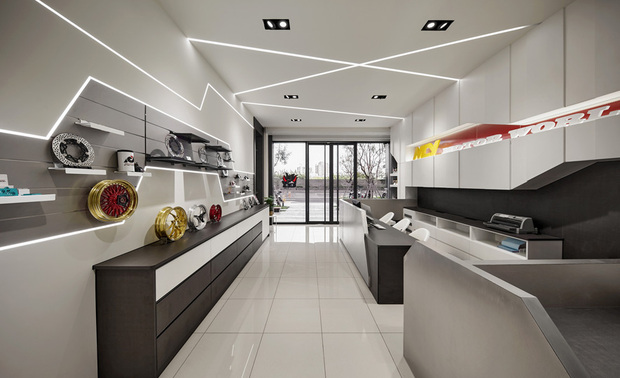 
柜檯、展示区
Front Counter & Display Area

甫踏进门，柜檯以金属隔板包覆并汇入圆角，降低顾客入店后的压迫感，带来和缓的第一印象，后方柜体则因应檯面水槽向上收束，提升人员使用时的安全性；对侧摆置各式零件的展示区，採用沟槽板搭配可移动式层板，方便店员调整商品陈列。

Upon stepping inside, the front counter is enveloped in waist-high metal partitions with rounded edges, alleviating any oppressive, cramped feeling and creating a welcoming first impression. The cabinets at the rear are thoughtfully designed with an upward taper to accommodate the countertop sink, ensuring the safety of staff members during usage. On the opposite side, a display area presents a variety of components using groove panels and movable shelves, allowing store clerks to arrange product showcases effortlessly.
